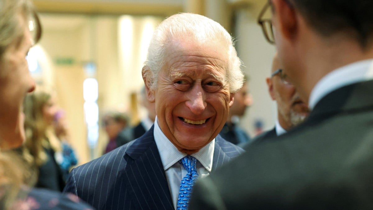 Britain's King Charles III reacts as he visits the Disasters Emergency Committee at St Peter’s Church on December 04, 2024 in London, England.