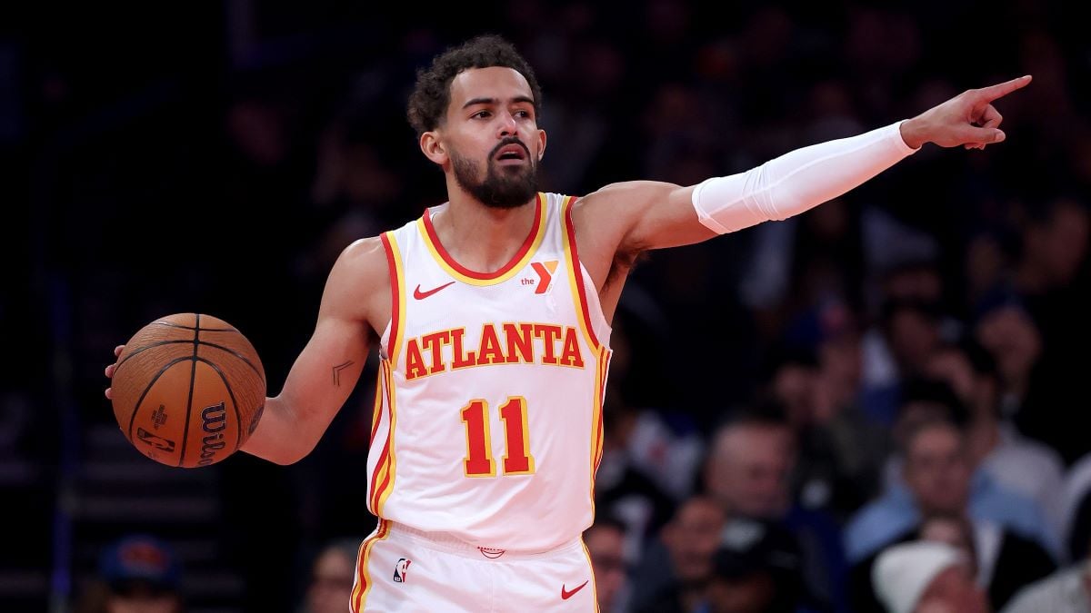 Trae Young #11 of the Atlanta Hawks directs his teammates during the first half of the quarterfinal game of the Emirates NBA Cup against the New York Knicks at Madison Square Garden on December 11, 2024 in New York City. NOTE TO USER: User expressly acknowledges and agrees that, by downloading and or using this photograph, User is consenting to the terms and conditions of the Getty Images License Agreement. (Photo by Elsa/Getty Images)