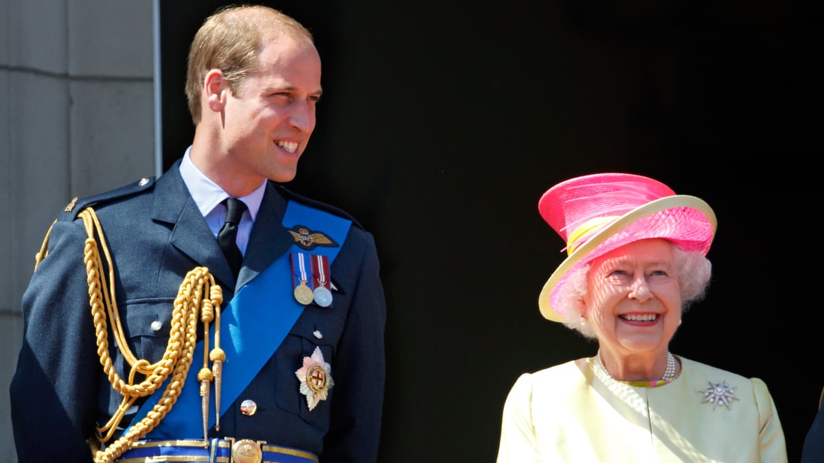 Prince William, Duke of Cambridge and Queen Elizabeth II watch a flypast of Spitfire & Hurricane aircraft from the balcony of Buckingham Palace to commemorate the 75th Anniversary of The Battle of Britain on July 10, 2015 in London, England.