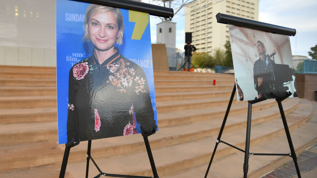 Photos of cinematographer Halyna Hutchins are displayed before a vigil held to honor her at Albuquerque Civic Plaza on October 23, 2021 in Albuquerque, New Mexico. Hutchins was killed on set while filming the movie "Rust" at Bonanza Creek Ranch near Santa Fe, New Mexico on October 21, 2021. The film's star and producer Alec Baldwin discharged a prop firearm that hit Hutchins and director Joel Souza. 