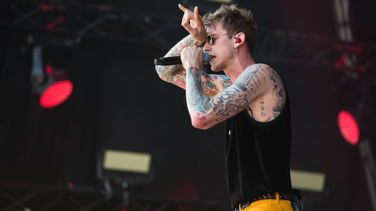 Machine Gun Kelly photographed at a concert in June 2017.