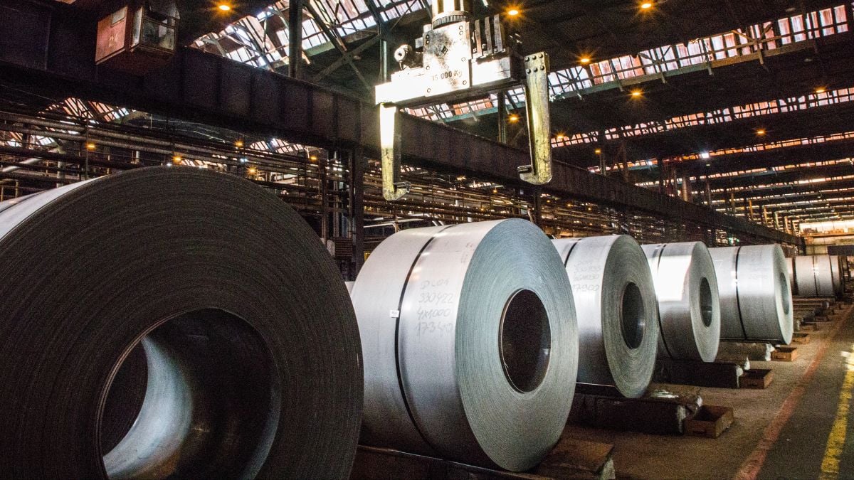 spools of steel sit on an industrial line