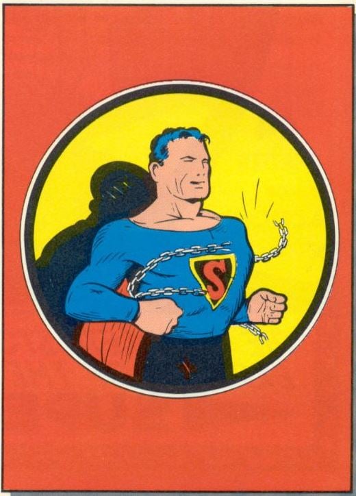 Superman breaking chains with his peck in the back cover of 1939's Superman #1.