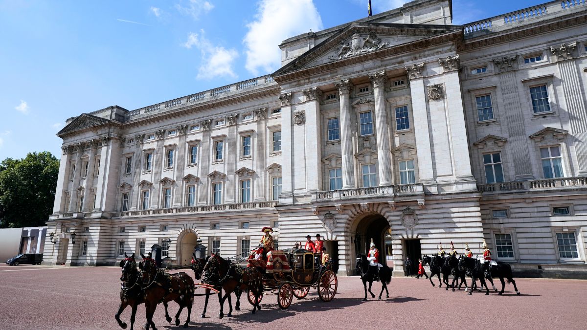 LONDON, ENGLAND - JULY 17: The Imperial State Crown, the Cap of Maintenance and the Sword of State are transported in Queen Alexandra's State Coach, as it leaves Buckingham Palace to travel to the State Opening of Parliament in the House of Lords on July 17, 2024 in London, England. King Charles III delivers the King's Speech setting out the new Labour government's policies and proposed legislation for the coming parliamentary session. (Photo by Andrew Matthews - WPA Pool/Getty Images)