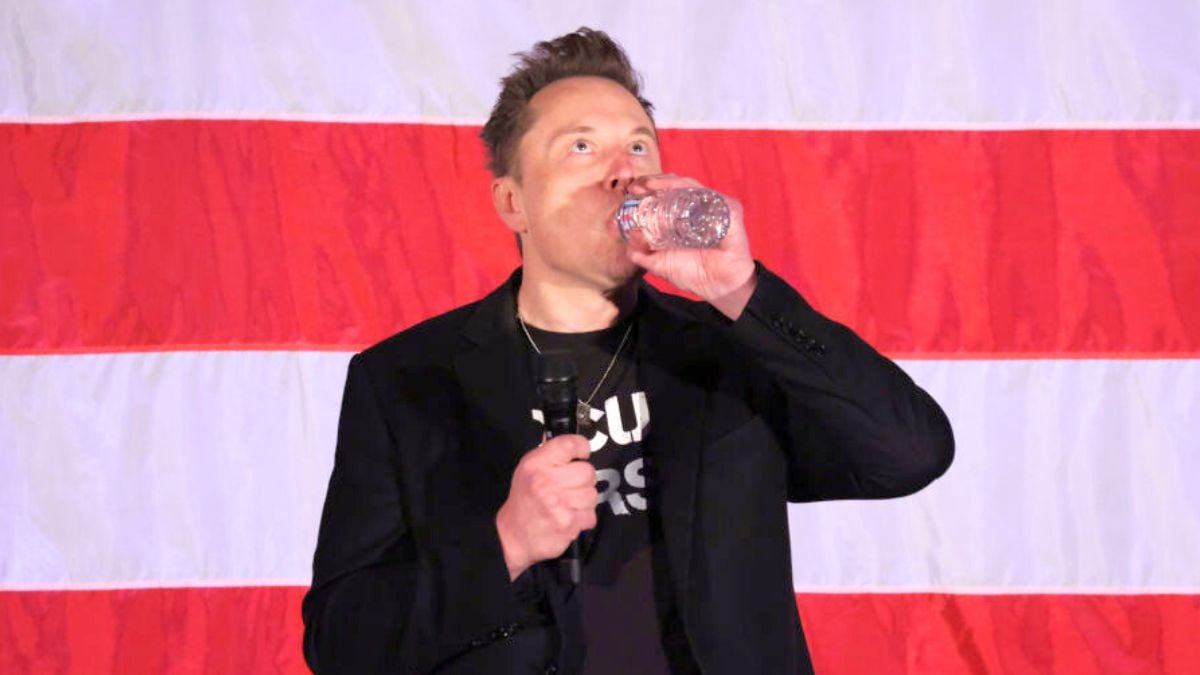 OAKS, PENNSYLVANIA - OCTOBER 18: SpaceX and Tesla founder Elon Musk takes a sip of water during a town hall for Republican presidential nominee, former U.S. President Donald Trump at the The Greater Philadelphia Expo Center & Fairgrounds on October 18, 2024 in Oaks, Pennsylvania. Musk is campaigning for former U.S. President Donald Trump and is urging his supporters to take advantage of absentee and early voting in what is expected to be a tight race in Pennsylvania. (Photo by Alex Wong/Getty Images)