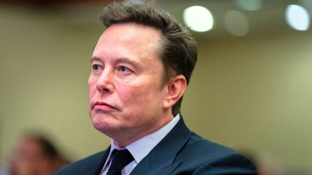 WASHINGTON, DC - NOVEMBER 13: Elon Musk listens as US President-elect Donald Trump speaks during a House Republicans Conference meeting at the Hyatt Regency on Capitol Hill on November 13, 2024 in Washington, DC. As is tradition with incoming presidents, President-elect Trump is traveling to Washington, DC to meet with U.S. President Joe Biden at the White House as well as Republican members of Congress on Capitol Hill. (Photo by Allison Robbert-Pool/Getty Images)