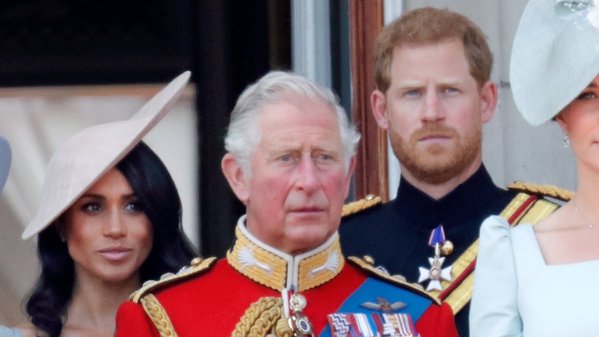 Meghan, Duchess of Sussex, Prince Charles, Prince of Wales and Prince Harry, Duke of Sussex stand on the balcony of Buckingham Palace during Trooping The Colour 2018 on June 9, 2018 in London, England. The annual ceremony involving over 1400 guardsmen and cavalry, is believed to have first been performed during the reign of King Charles II. The parade marks the official birthday of the Sovereign, even though the Queen's actual birthday is on April 21st.