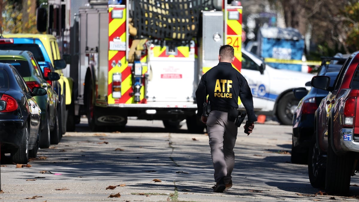 NEW ORLEANS, LOUISIANA - JANUARY 01: Police and fire trucks are seen outside a house fire on Mandeville Street that may be connected to the mass casualty Bourbon Street attack where at least ten people were killed when a person allegedly drove into the crowd in the early morning hours of New Year's Day on January 1, 2025 in New Orleans, Louisiana. Dozens more were injured after a suspect in a rented pickup truck allegedly drove around barricades and through a crowd of New Year's revelers on Bourbon Street. The suspect then got out of the car, opened fire on police officers, and was subsequently killed by law enforcement.