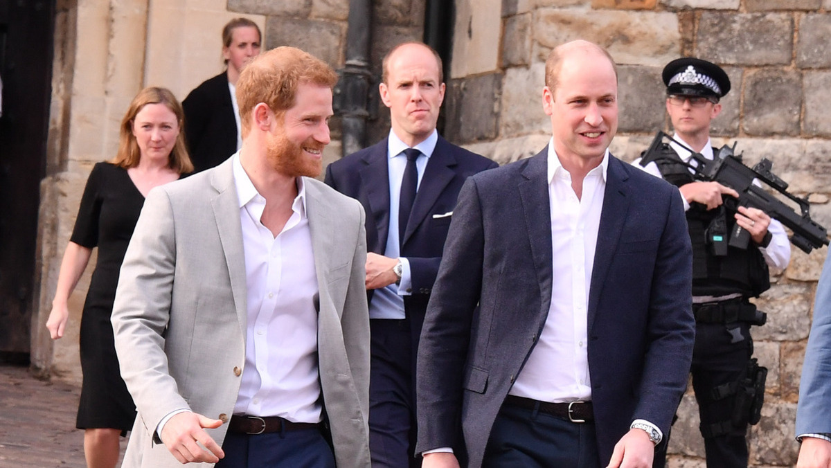 WINDSOR, ENGLAND - MAY 18: Prince Harry and Prince William meet the public in Windsor on the eve of the wedding at Windsor Castle on May 18, 2018 in Windsor, England.