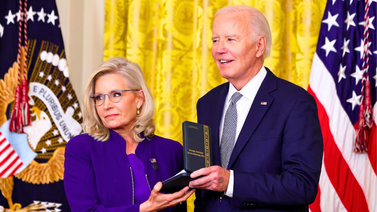 Joe Biden presents former U.S. Rep. Liz Cheney (R-WY) with the Presidential Citizens Medal during a ceremony in the East Room of the White House