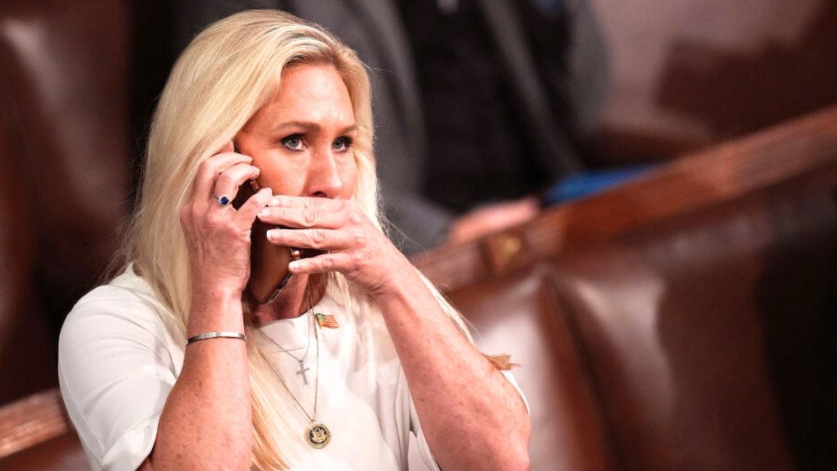 WASHINGTON, DC - JANUARY 03: U.S. Rep. Marjorie Taylor Greene (R-GA) talks on the phone as the House votes for a Speaker of the House on the first day of the 119th Congress in the House Chamber of the U.S. Capitol Building on January 03, 2025 in Washington, DC. Rep. Mike Johnson (R-LA) is working to retain the Speakership in the face of opposition within his own party as the 119th Congress holds its first session to vote for a new Speaker of the House. (Photo by Andrew Harnik/Getty Images)