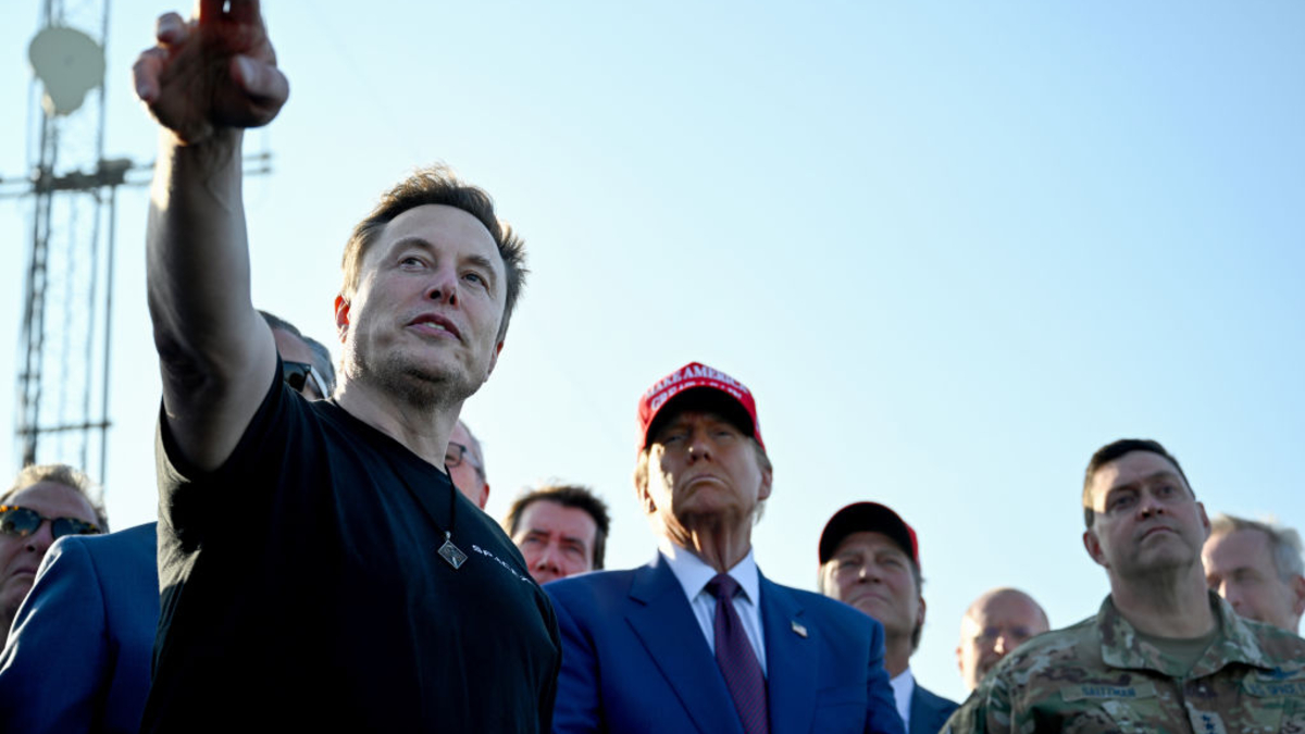 Elon Musk speaks with U.S. President-elect Donald Trump and guests at a viewing of the launch of the sixth test flight of the SpaceX Starship rocket on November 19, 2024 in Brownsville, Texas. SpaceX’s billionaire owner, Elon Musk, a Trump confidante, has been tapped to lead the new Department of Government Efficiency alongside former presidential candidate Vivek Ramaswamy. 