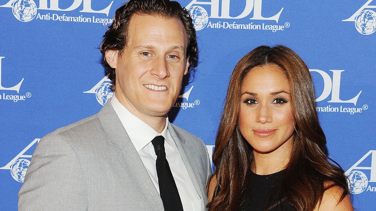 Trevor Engelson and Meghan Markle