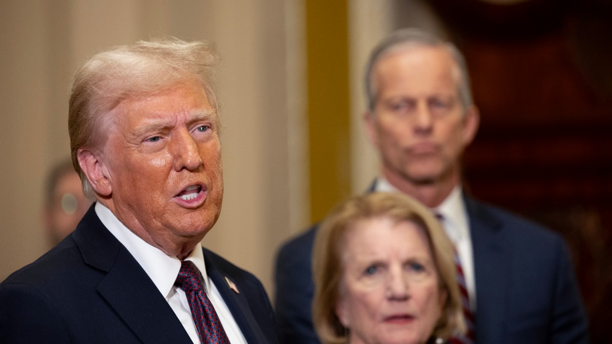 WASHINGTON, DC - JANUARY 08: U.S. President-elect Donald Trump speaks to the media as Sen. Shelley Moore Capito (R-WV) and Senate Majority Leader John Thune (R-SD) look on at the U.S. Capitol on January 8, 2025 in Washington, DC.