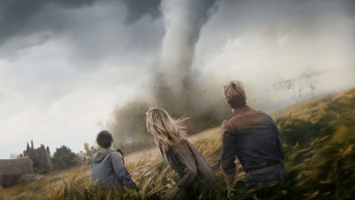 The cast of 'Twisters' looks up at a menacing tornado