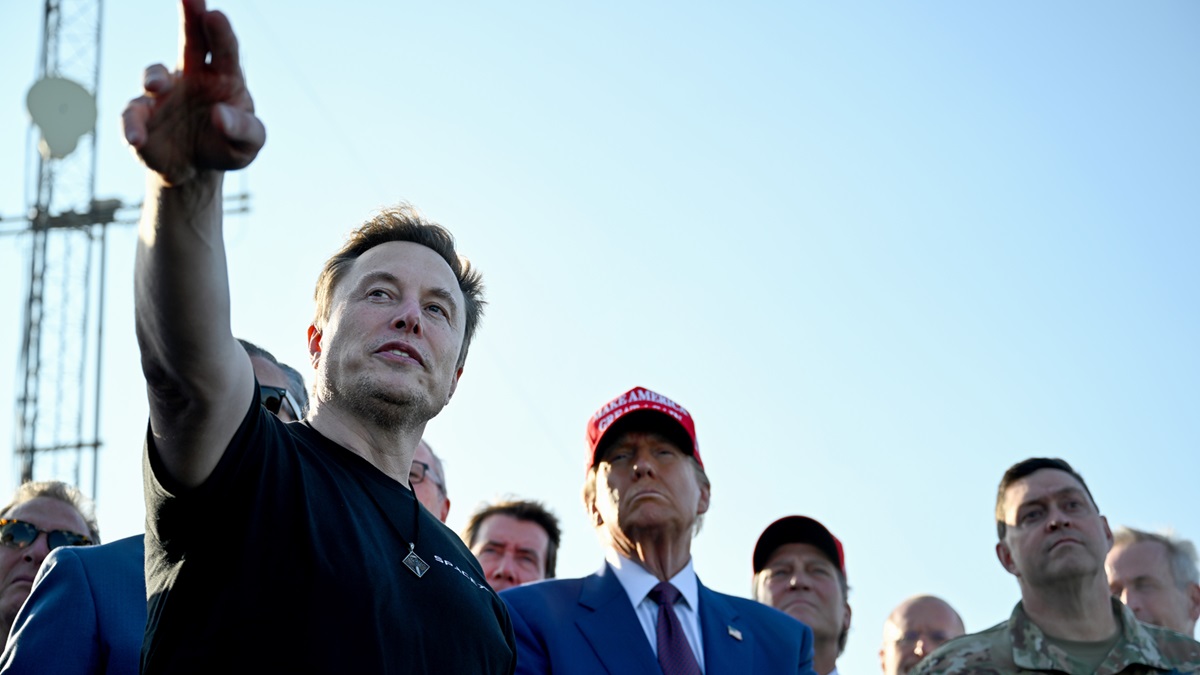 BROWNSVILLE, TEXAS - NOVEMBER 19: Elon Musk speaks with U.S. President-elect Donald Trump and guests at a viewing of the launch of the sixth test flight of the SpaceX Starship rocket on November 19, 2024 in Brownsville, Texas.