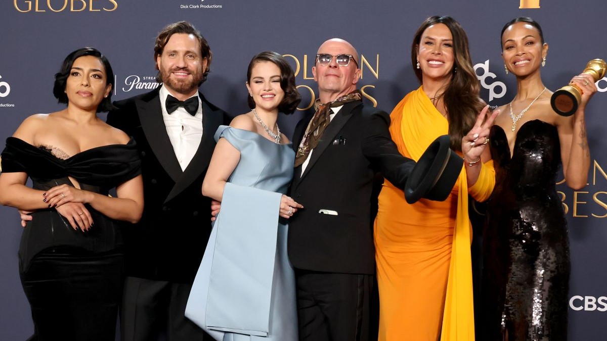 BEVERLY HILLS, CALIFORNIA - JANUARY 05: (L-R) Adriana Paz, Edgar Ramírez, Selena Gomez, Jacques Audiard, Karla Sofía Gascón, and Zoe Saldana, winners of the Best Motion Picture - Musical or Comedy award for “Emilia Pérez,” pose in the press room during the 82nd Annual Golden Globe Award at The Beverly Hilton on January 05, 2025 in Beverly Hills, California.