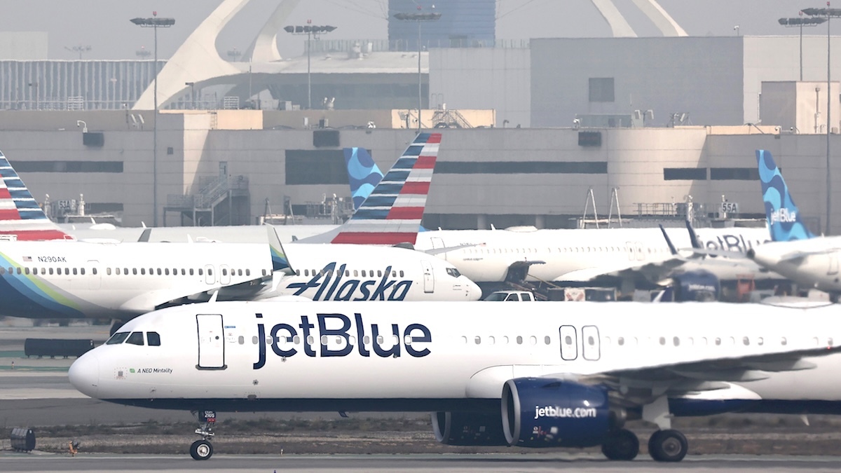 A JetBlue plane taxis after landing at Los Angeles International Airport (LAX)