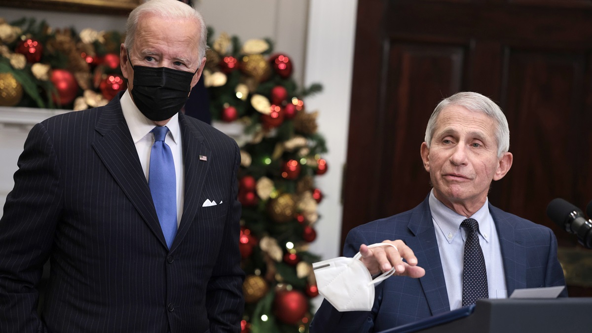 WASHINGTON, DC - NOVEMBER 29: Anthony Fauci (R), Director of the National Institute of Allergy and Infectious Diseases and Chief Medical Advisor to the President, speaks alongside U.S. President Joe Biden as he delivers remarks on the Omicron COVID-19 variant following a meeting of the COVID-19 response team at the White House on November 29, 2021 in Washington, DC.