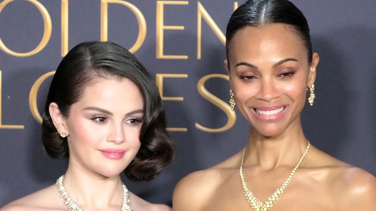 Selena Gomez and Zoe Saldana, winner of the Best Performance by a Female Actor in a Supporting Role in any Motion Picture award for “Emilia Pérez,” pose in the press room at the 82nd Annual Golden Globe Awards at The Beverly Hilton on January 05, 2025 in Beverly Hills, California.