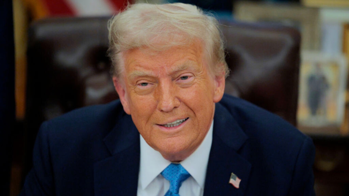 U.S. President Donald Trump talks to reporters after signing an executive order, "Unleashing prosperity through deregulation," in the Oval Office on January 31, 2025 in Washington, DC.