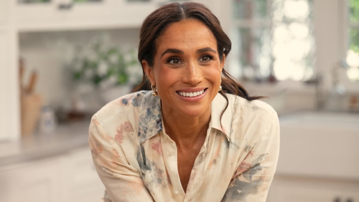 Meghan Markle grins in her kitchen in Netflix's With Love, Meghan