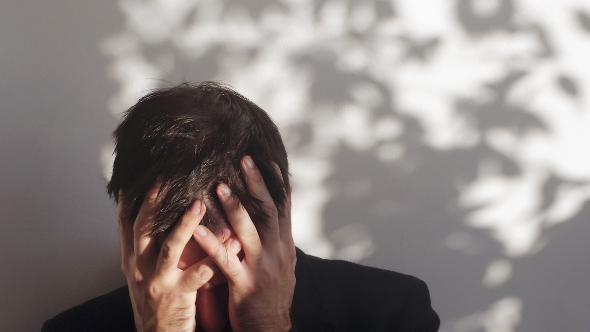 Troubled man suffering mental illness