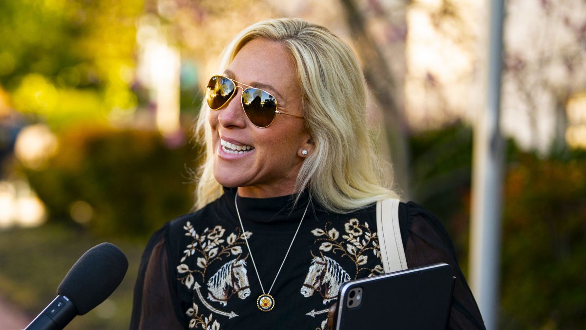 Rep. Marjorie Taylor Greene (R-Ga.) speaks to reporters while arriving at the Capitol Hill Club for a meeting of the House Republican Conference on March 25, 2025 in Washington, DC. Republicans are meeting as the Trump administration faces blowback after defense plans were posted to a group chat that accidentally included a prominent journalist. (Photo by Al Drago/Getty Images)