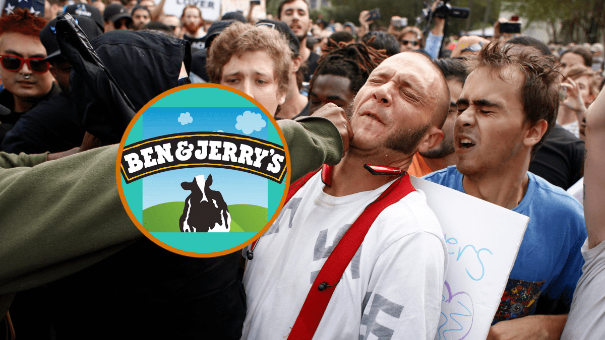 A man wearing a shirt with swastikas on it is punched by an unidentified member of the crowd near the site of a planned speech by white nationalist Richard Spencer, who popularized the term 'alt-right', at the University of Florida campus on October 19, 2017 in Gainesville, Florida. A state of emergency was declared on Monday by Florida Gov. Rick Scott to allow for increased law enforcement due to fears of violence. (Photo by Brian Blanco/Getty Images)