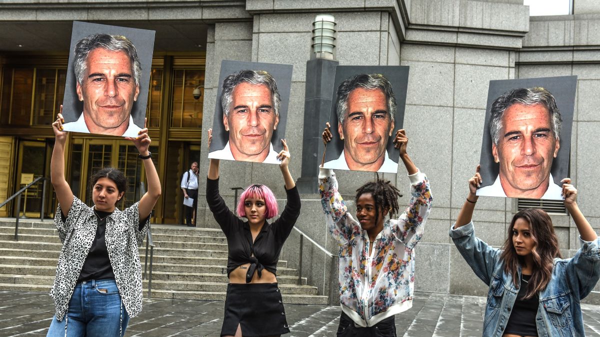 A protest group called "Hot Mess" hold up signs of Jeffrey Epstein in front of the Federal courthouse on July 8, 2019 in New York City. According to reports, Epstein will be charged with one count of sex trafficking of minors and one count of conspiracy to engage in sex trafficking of minors. (Photo by Stephanie Keith/Getty Images)