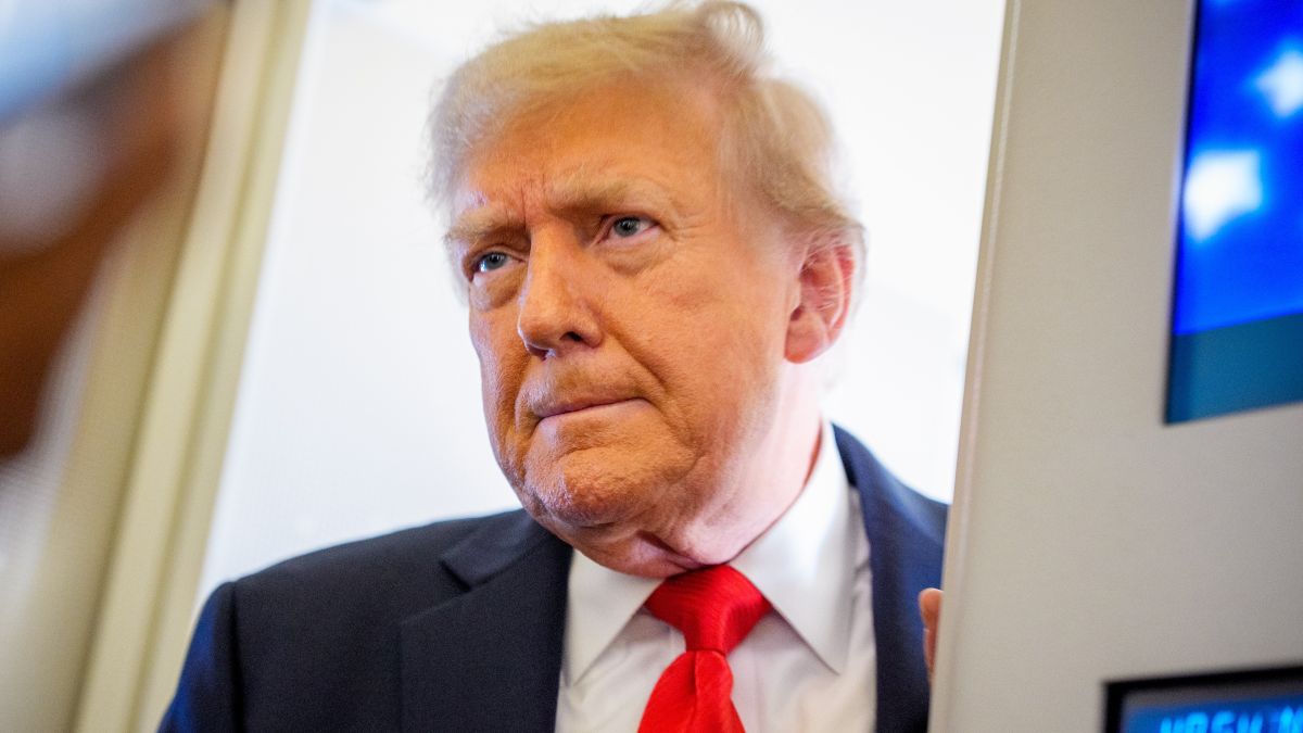 U.S. President Donald Trump takes a question from a reporter aboard Air Force One on August 15, 2025, in flight. President Trump is traveling to Anchorage, Alaska, for peace talks with Russian President Vladimir Putin on the war with Ukraine. (Photo by Andrew Harnik/Getty Images)