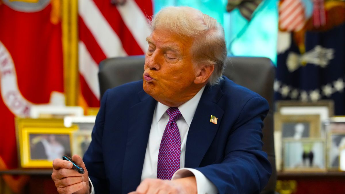U.S. President Donald Trump signs executive orders during a press availability in the Oval Office of the White House on September 05, 2025 in Washington, DC. President Trump signed executive orders which included the renaming of the Department of Defense to the Department of War. (Photo by Kevin Dietsch/Getty Images)