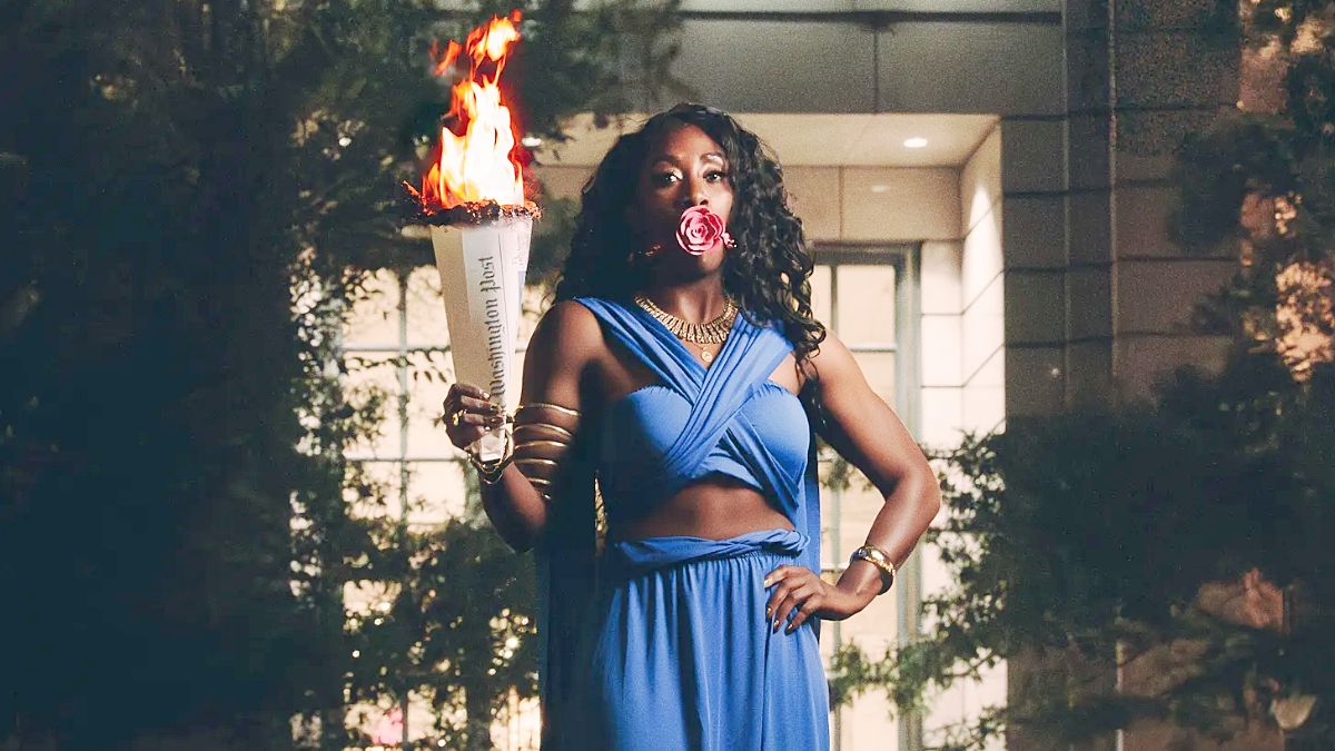 Karen Attiah burning the Washington Post paper