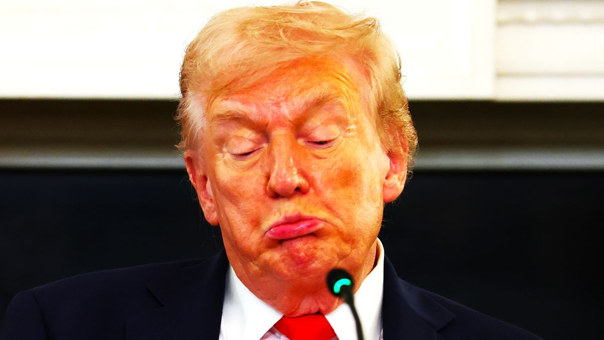 U.S. President Donald Trump reads a note handed to him by U.S. Secretary of State Marco Rubio he said was regarding Middle East peace talks during a roundtable discussion in the State Dining Room of the White House on October 08, 2025 in Washington, DC. Trump’s administration held the roundtable to discuss the anti-fascist Antifa movement after signing an executive order designating it as a “domestic terrorist organization”. (Photo by Anna Moneymaker/Getty Images)