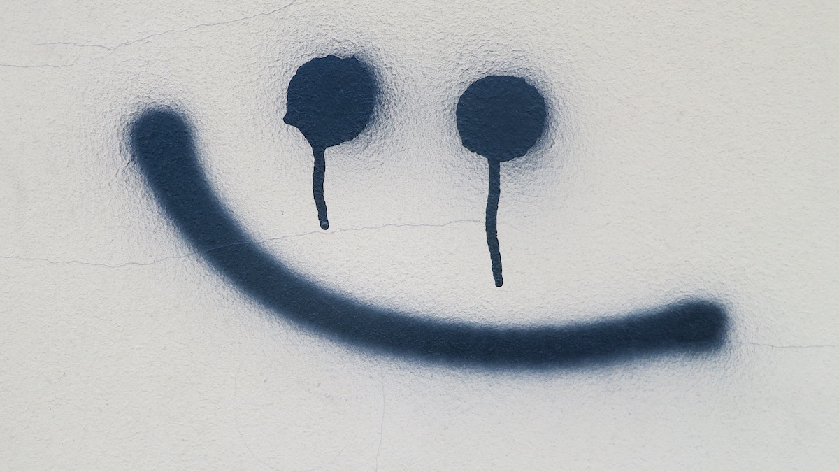 Graffiti spooky smile on the wall