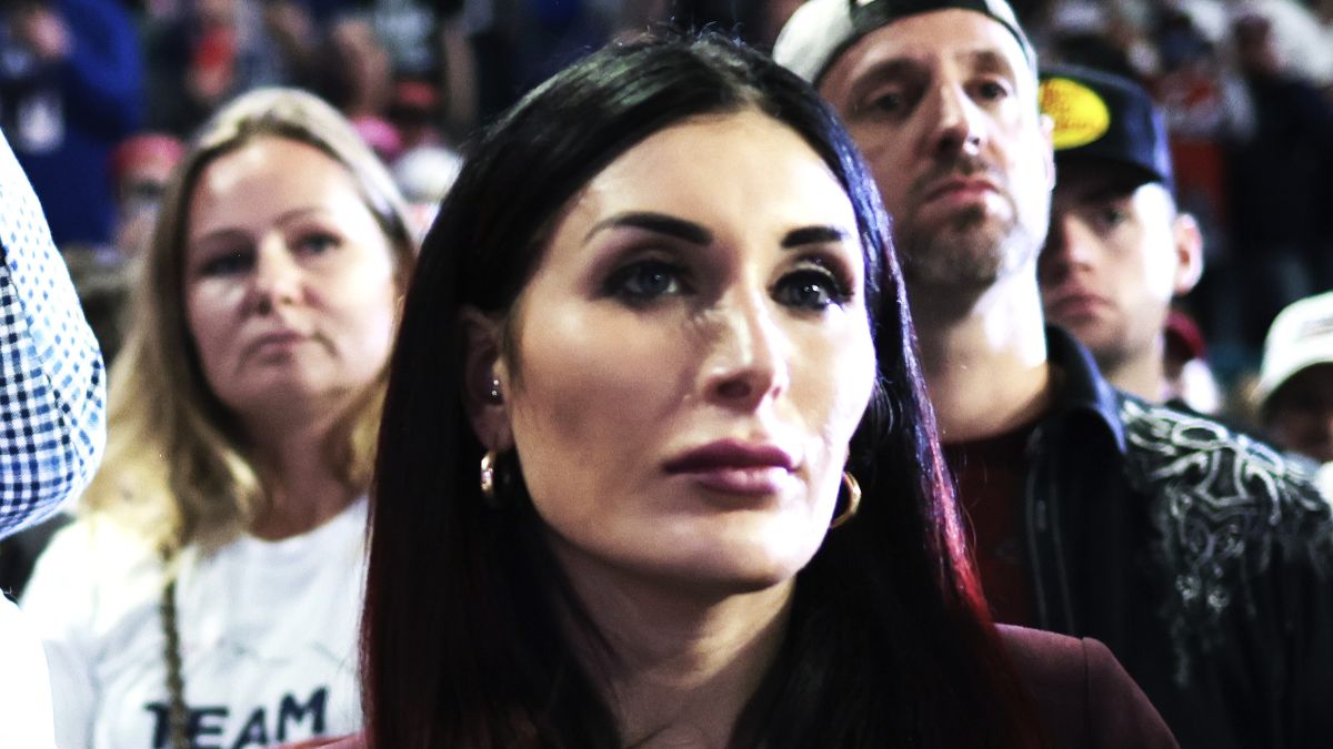 Trump supporters Siggy Flicker (L) and far-right activist Laura Loomer listen as Republican presidential candidate and former President Donald Trump speaks during a Get Out The Vote rally at Coastal Carolina University on February 10, 2024 in Conway, South Carolina. South Carolina holds its Republican primary on February 24. (Photo by Win McNamee/Getty Images)