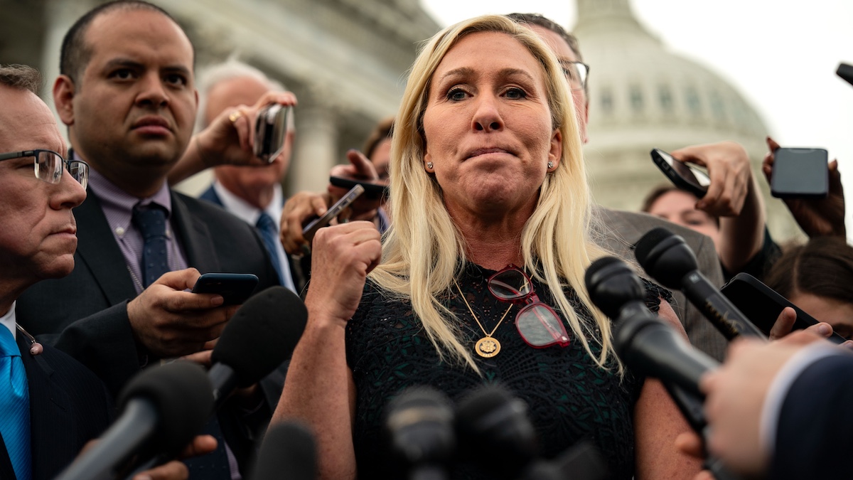 WASHINGTON, DC - MAY 8: Rep. Marjorie Taylor Greene (R-GA), and Rep. Thomas Massie (R-KY), speak to members of the press on the steps of the House of Representatives at the U.S. Capitol on May 8, 2024 in Washington, DC. The House voted overwhelmingly to save Speaker Johnson from Marjorie Taylor Greene's push to oust him from his leadership position, voting 359 to 43 to table the motion to vacate.