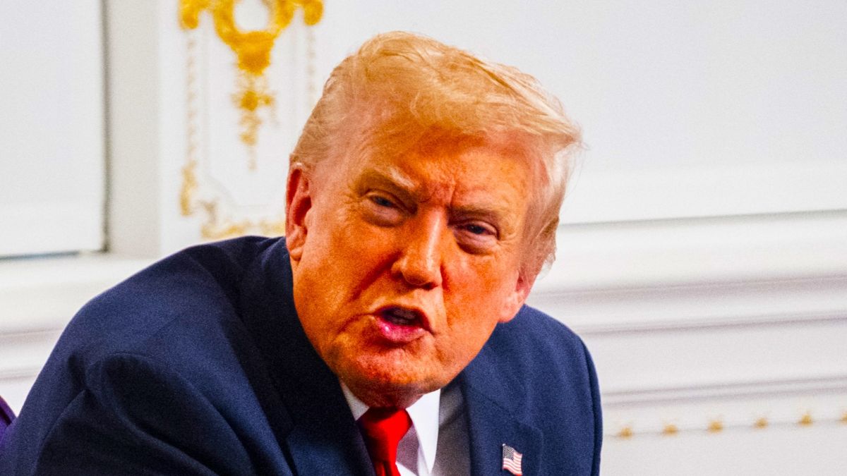 President Donald Trump participates in a call with U.S. service members from his Mar-a-Lago club in Florida on Thanksgiving Day on November 27, 2025 in Palm Beach, Florida. (Photo by Pete Marovich/Getty Images)