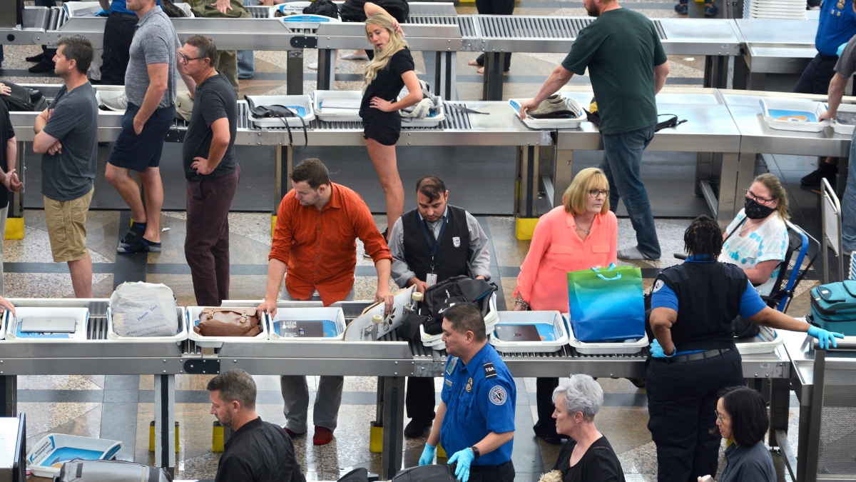DENVER, COLORADO - AUGUST 30, 2019: Airplane passengers proceed through the TSA security checkpoint at Denver International Airport in Denver, Colorado. (Photo by Robert Alexander/Getty Images)