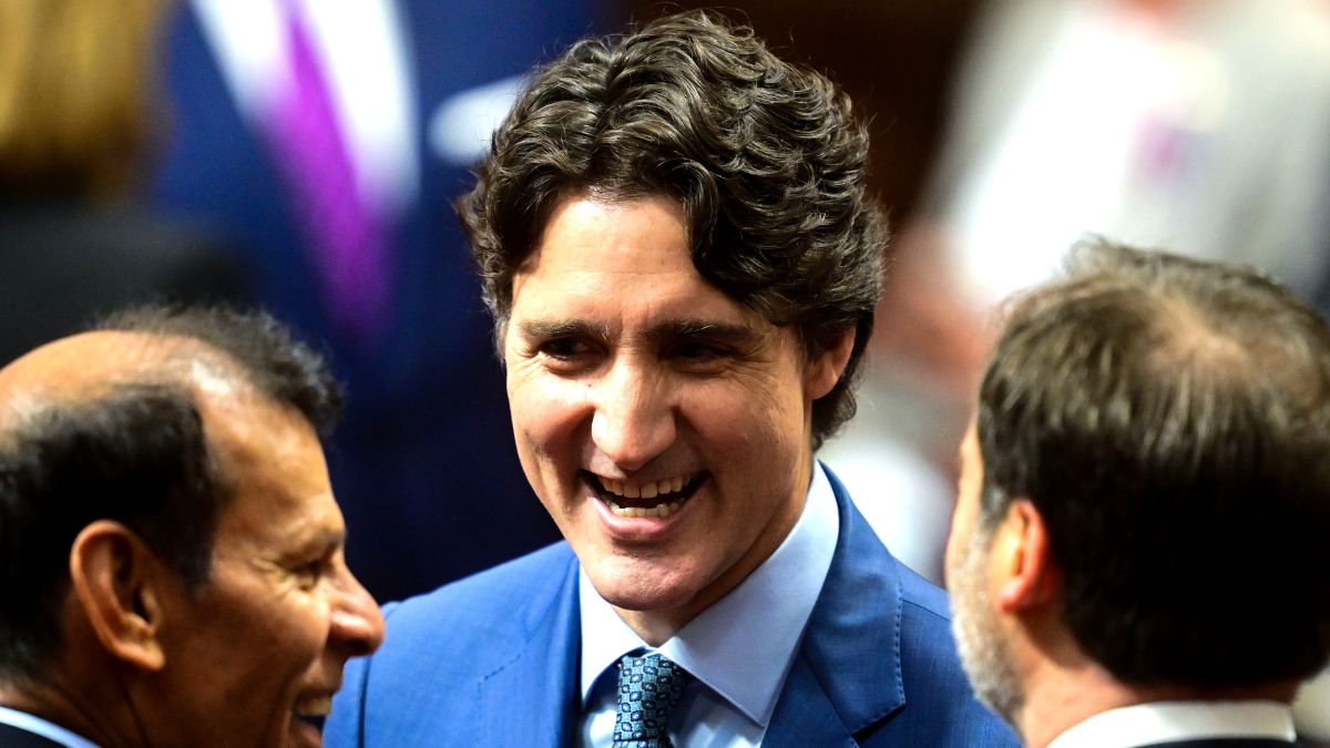 Former Canadian Prime Minister Justin Trudeau (C) greets people before Britain's King Charles III delivers a speech from the Throne to open the first session of the 45th Parliament of Canada at the Senate of Canada on May 27, 2025 in Ottawa, Canada. It is The King's 20th and Queen's 5th tour of Canada, with their previous visit being in 2022. (Photo by Victoria Jones - Pool/Getty Images)