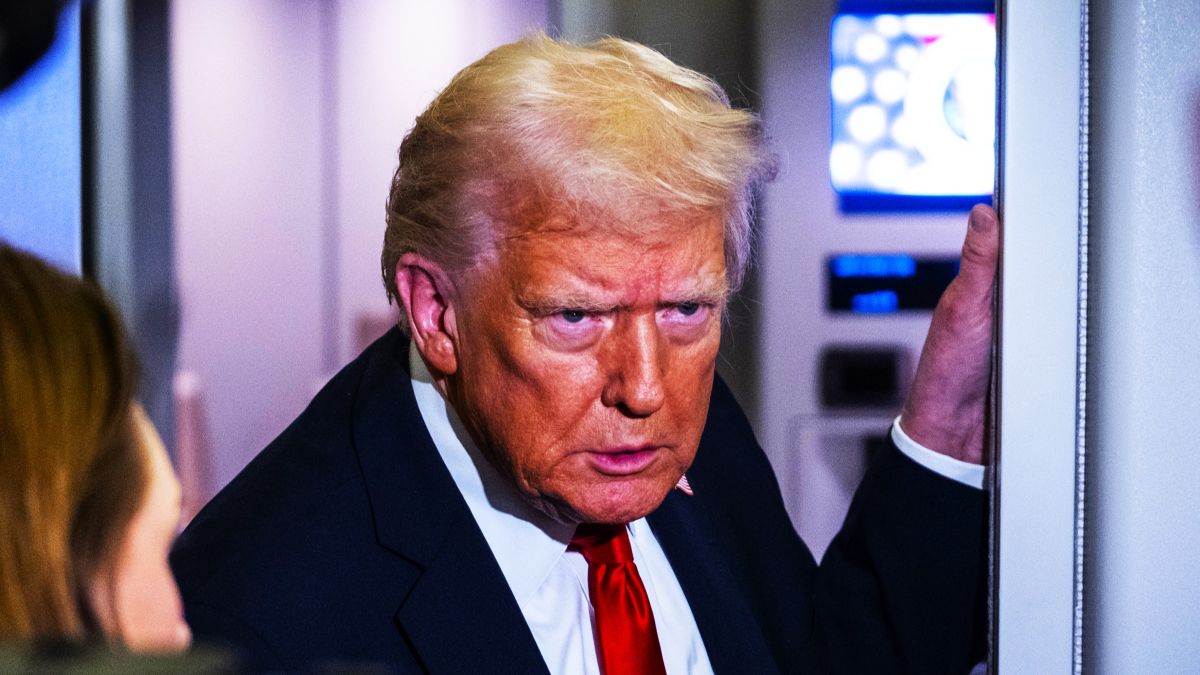 President Donald Trump speaks to the media aboard Air Force One on November 25, 2025 in flight en route to Florida. The Trumps are traveling to Mar-a-Lago in Palm Beach, Florida for the Thanksgiving holiday. (Photo by Pete Marovich/Getty Images)
