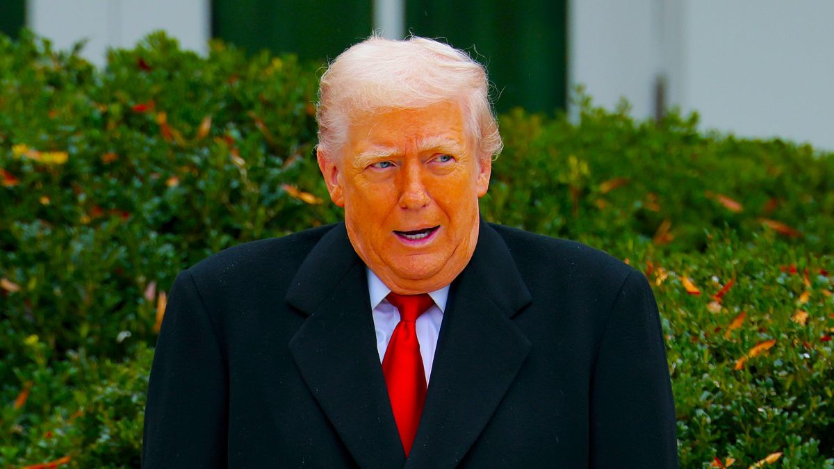 U.S. President Donald Trump pardons National Thanksgiving Turkey Gobble during the 78th annual National Thanksgiving Turkey Presentation in the Rose Garden of the White House on November 25, 2025 in Washington, DC. Trump pardoned Gobble and alternate turkey Waddle, who were both raised in North Carolina and will live out the rest of their lives under the care of the Prestage Department of Poultry Science at North Carolina State University in Raleigh. (Photo by Heather Diehl/Getty Images)