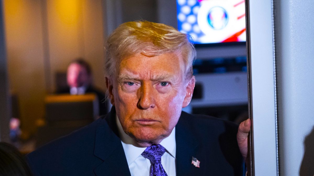 President Donald Trump speaks to the press aboard Air Force One en-route to Washington, DC on November 30, 2025. The first family is returning to Washington, DC after spending the Thanksgiving holiday at Mar-A-Lago Resort In Florida. (Photo by Pete Marovich/Getty Images)