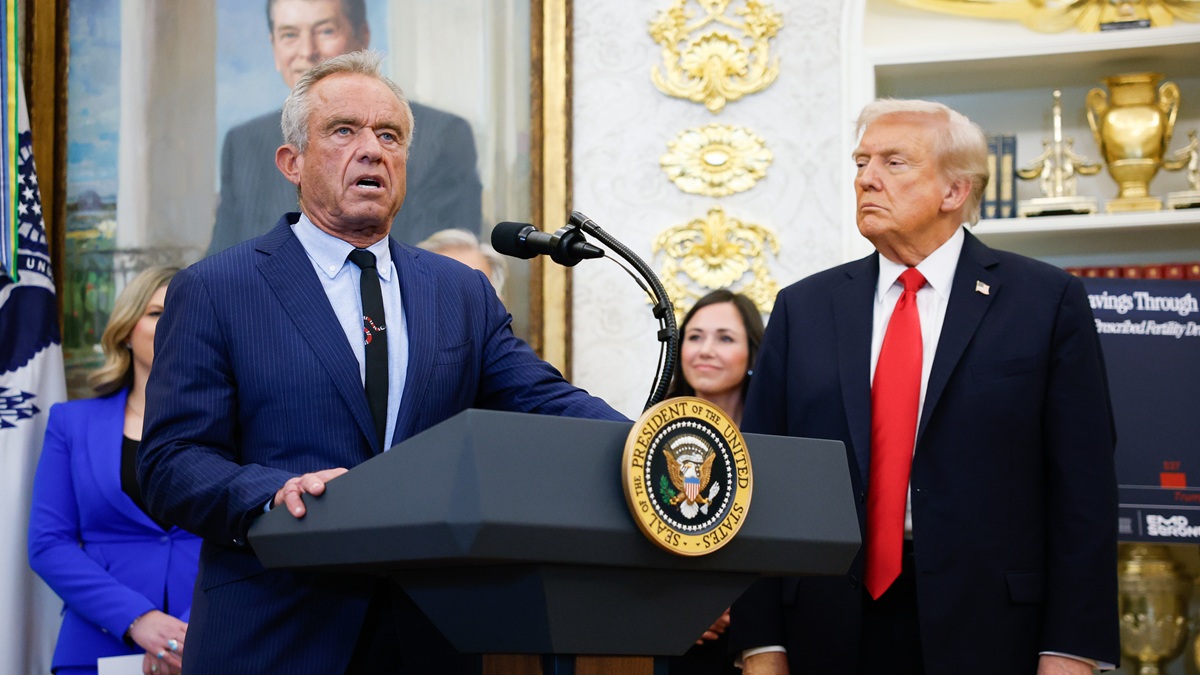 WASHINGTON, DC - OCTOBER 16: Secretary of Health and Human Services Robert F. Kennedy Jr. delivers remarks as U.S. President Donald Trump looks on during an event in the Oval Office of the White House on October 16, 2025 in Washington, DC. U.S. President Donald Trump outlined plans during the event to expand vitro fertilization (IVF) access by encouraging workplace benefits to include access to IVF and infertility coverage. (Photo by Kevin Dietsch/Getty Images)
