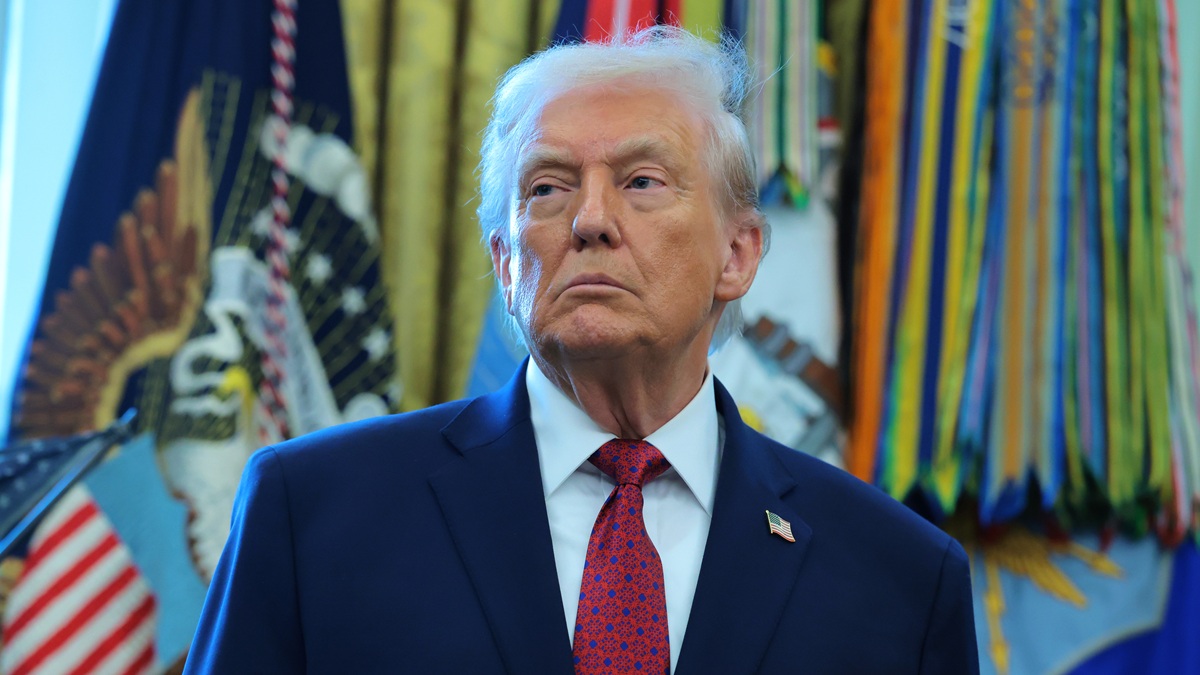 WASHINGTON, DC - DECEMBER 15: U.S. President Donald Trump listens during a ceremony for the presentation of the Mexican Border Defense Medal in the Oval Office of the White House on December 15, 2025 in Washington, DC. During the ceremony, Trump recognized the first 13 service members to receive the recently established Mexican Border Defense Medal (MBDM), which recognizes service members supporting Customs and Border Protection on the U.S.-Mexico border. (Photo by Anna Moneymaker/Getty Images)