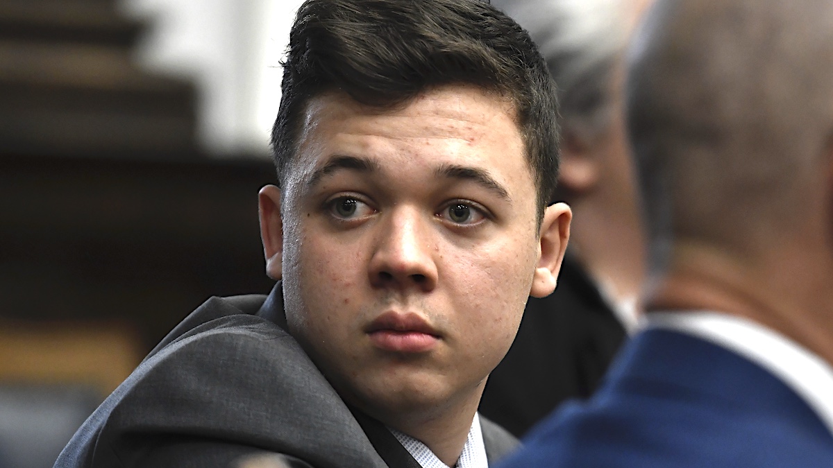 KENOSHA, WISCONSIN - NOVEMBER 17: Kyle Rittenhouse looks back as attorneys discuss items in the motion for mistrial presented by his defense during his trial at the Kenosha County Courthouse on November 17, 2021 in Kenosha, Wisconsin. Rittenhouse is accused of shooting three demonstrators, killing two of them, during a night of unrest that erupted in Kenosha after a police officer shot Jacob Blake seven times in the back while being arrested in August 2020. Rittenhouse, from Antioch, Illinois, was 17 at the time of the shooting and armed with an assault rifle. He faces counts of felony homicide and felony attempted homicide.