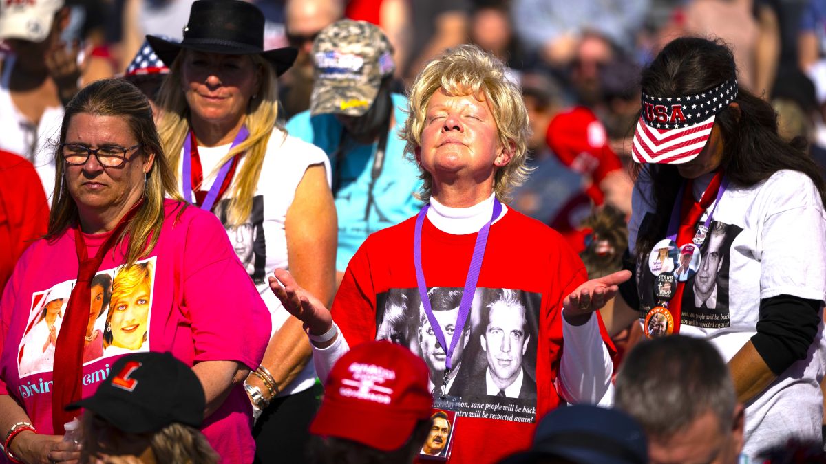 The crowd bows their heads in prayer during the invocation during a rally hosted by former President Donald Trump at the Delaware County Fairgrounds on April 23, 2022 in Delaware, Ohio. Last week, Trump announced his endorsement of J.D. Vance in the Ohio Republican Senate primary. (Photo by Drew Angerer/Getty Images)