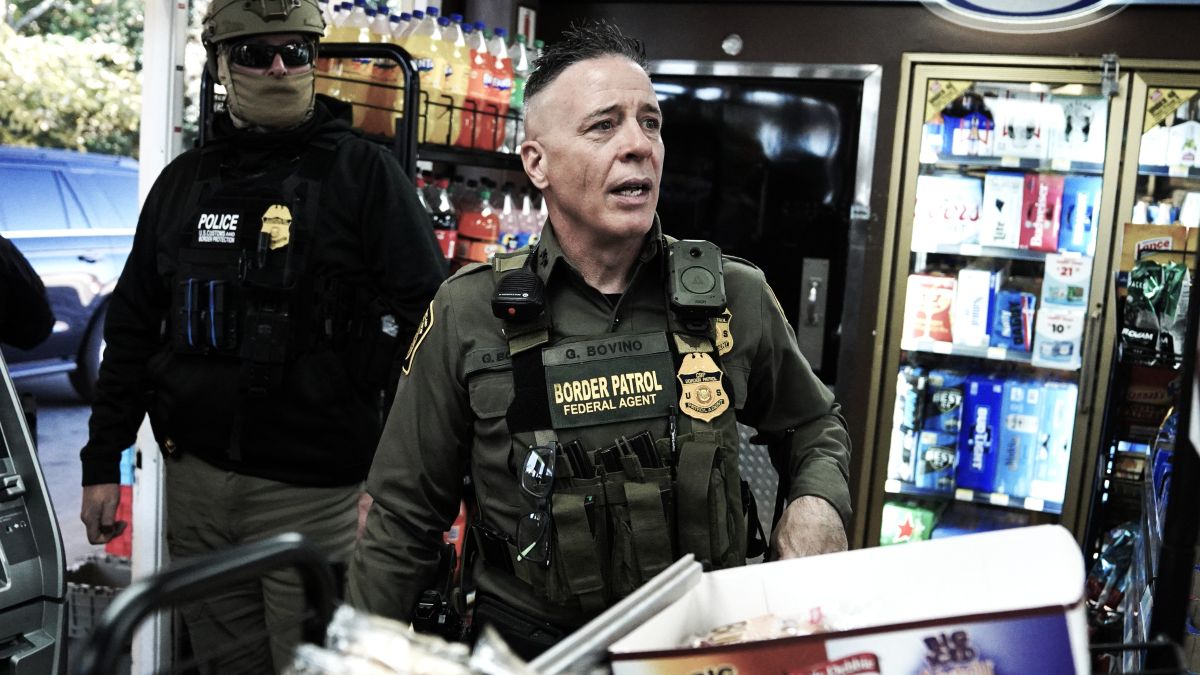 Border Patrol chief Greg Bovino walks through a gas station while searching for undocumented immigrants on November 17, 2025 in Charlotte, North Carolina. Federal agents are carrying out "Operation Charlotte's Web," an ongoing immigration enforcement surge across the Charlotte region(Photo by Ryan Murphy/Getty Images)