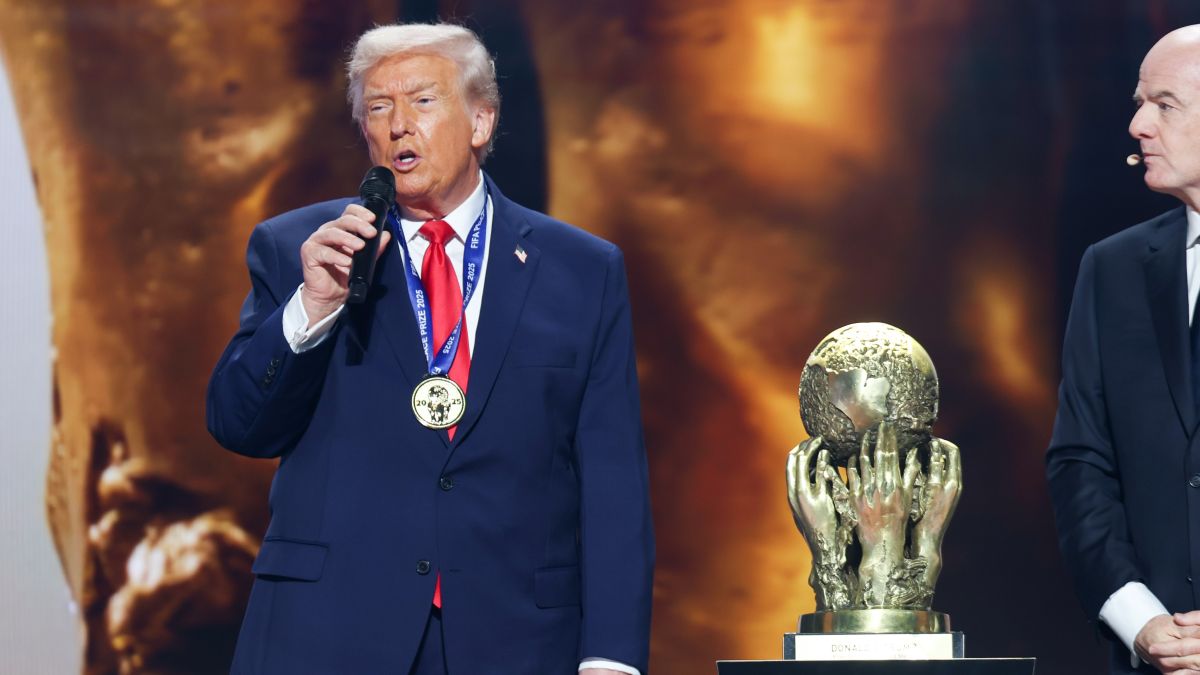 FIFA President Gianni Infantino presents the FIFA Peace Price to United States President Donald Trump during the FIFA World Cup 2026 Official Draw at John F. Kennedy Center for the Performing Arts on December 5, 2025 in Washington, DC. (Photo by Roger Wimmer/ISI Photos/ISI Photos via Getty Images)