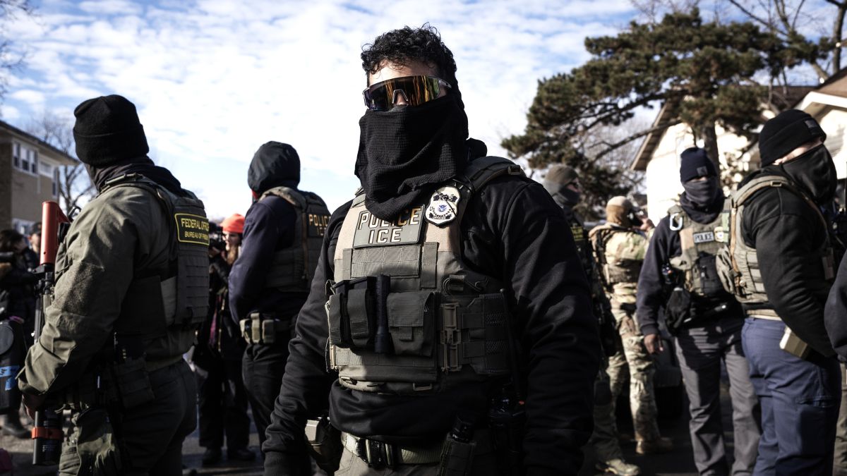 Border Patrol agents clash with residents in a neighborhood after a minor traffic accident on January 12, 2026 in Minneapolis, Minnesota. The Trump administration has sent an estimated 2,000 federal agents into the area as they make a push to arrest undocumented immigrants. (Photo by Scott Olson/Getty Images)